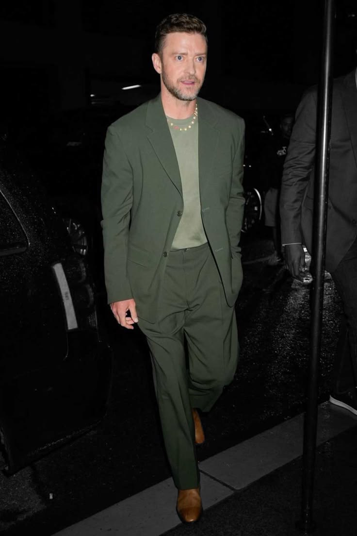 Olive green suit with a sage t-shirt and tan leather shoes