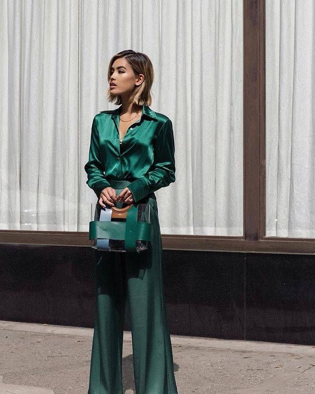 Emerald green satin blouse with matching wide-leg trousers